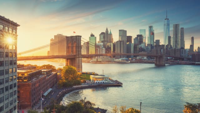  Retro style New York Manhattan with Brooklyn Bridge and Brooklyn Bridge Park in the front.