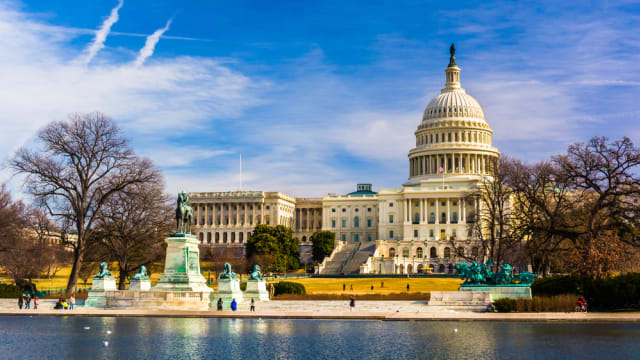  The Capitol and Reflecting Pool in Washington, DC.