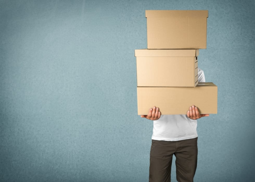 Man holding moving boxes