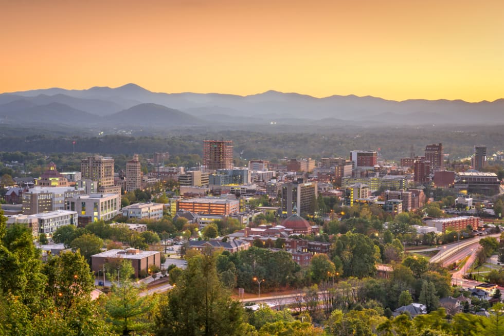  Asheville, North Carolina, USA downtown skyline at dusk.