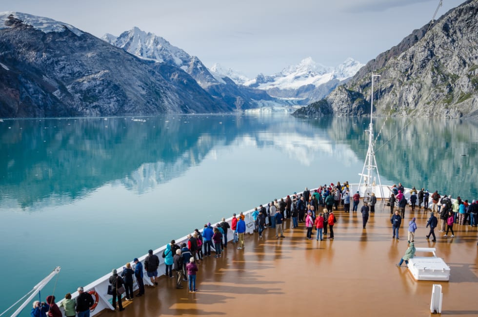 Cruise ship passengers get a close-up view of the majestic glaciers as they sail in Glacier Bay National Park and Preserve in Southeast Alaska.