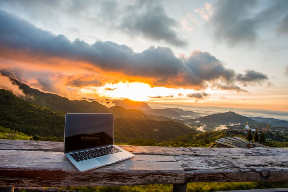 Freelancer office in mountain cafe
