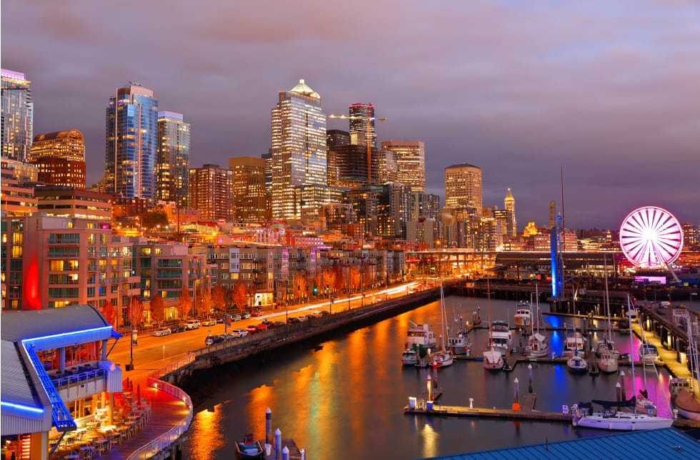 Seattle Skyline Showing the waterfront of Seattle After Sunset. The Central Waterfront of Seattle, is the most urbanized portion of Elliott Bay shore.