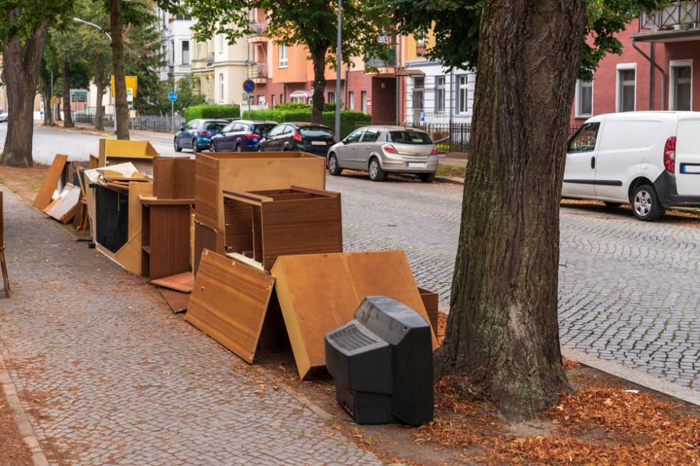 Furniture stacked on the side of the street in Boston on Moving Day