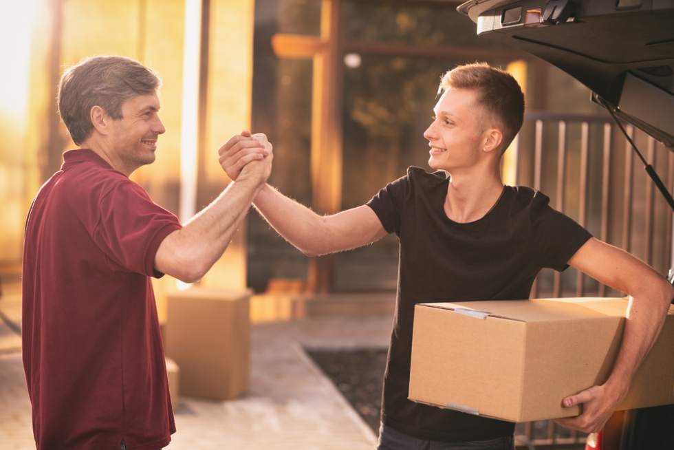Young man deciding it's time to move out of parents' house