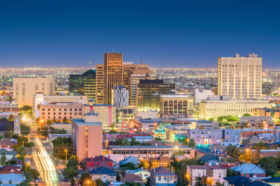 El Paso, Texas, USA downtown city skyline at dusk with Juarez, Mexico in the distance