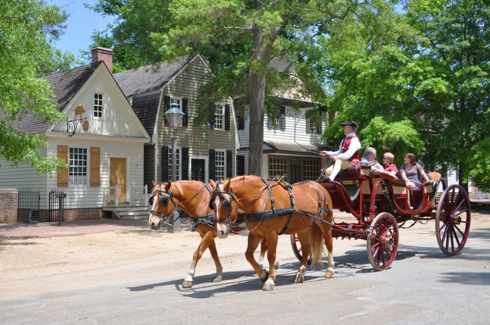 WILLIAMSBURG, VA, USA - MAY 7, 2012: Horse drawn carriage tours in British Colony in Williamsburg, Virginia, USA.