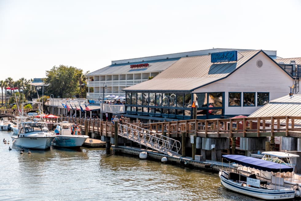 Charleston South Carolina with waterfront restaurants on Shem Creek and boats