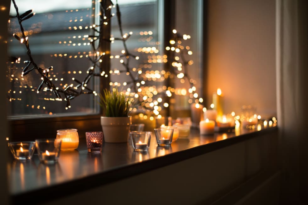 Candles against window