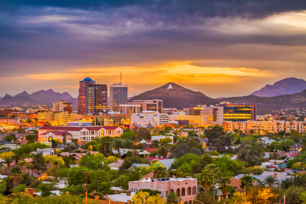 Tucson, Arizona, USA downtown skyline with Sentinel Peak at dusk. 