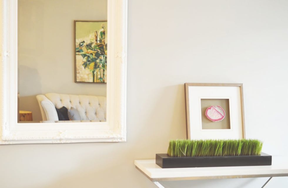 A mirror in a small living room