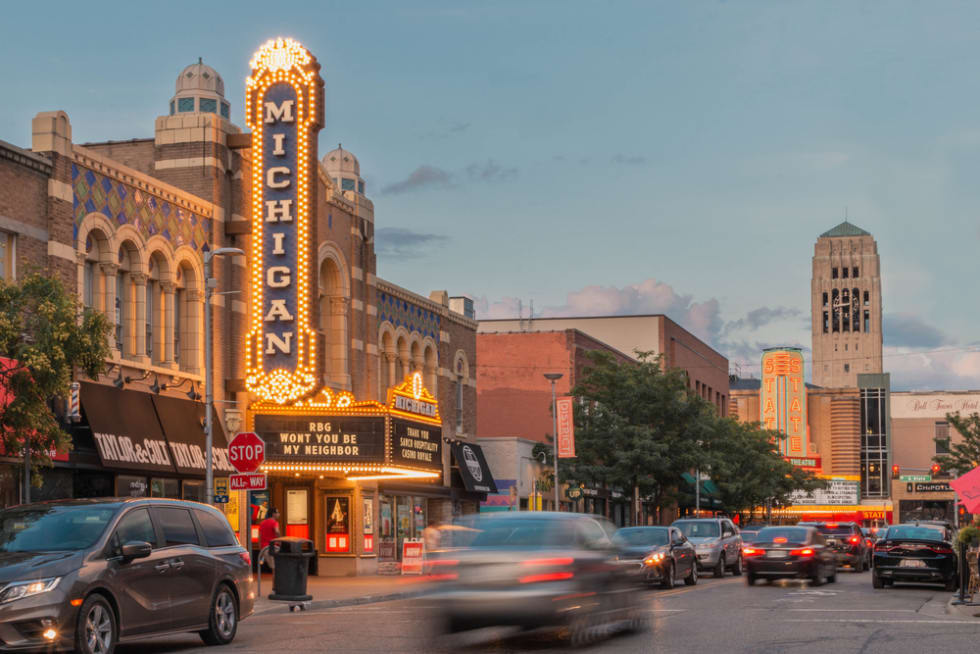 Ann Arbor, Michigan - Michigan Theater on State Street downtown during sunset with cars