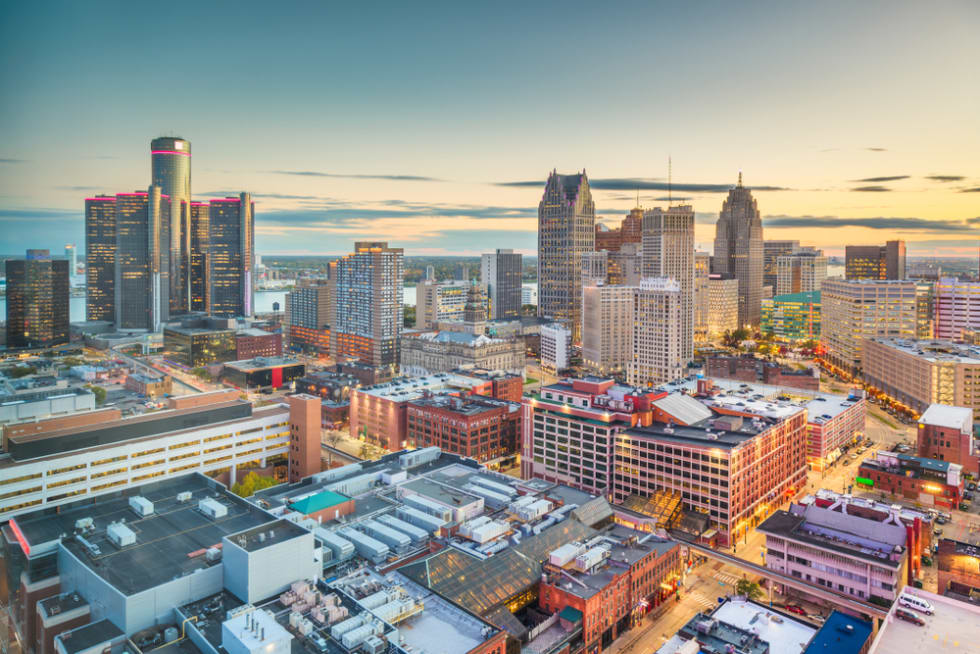 Detroit, Michigan, USA downtown skyline from above at dusk.