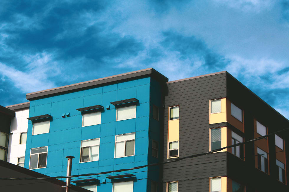 Blue and brown apartment building