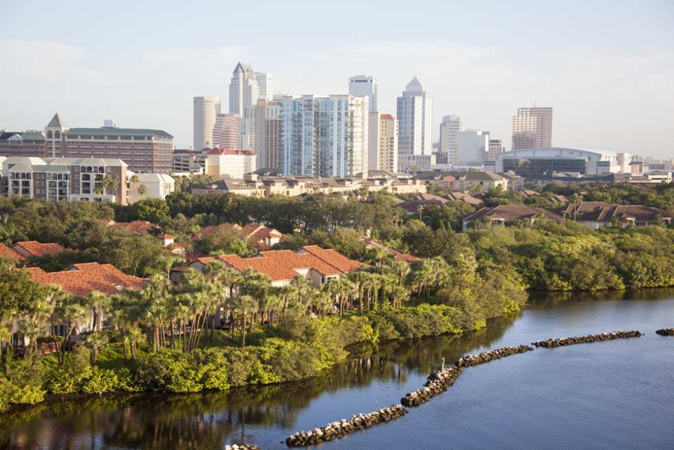  Morning view of Tampa city residential district with a downtown in a background (Florida).