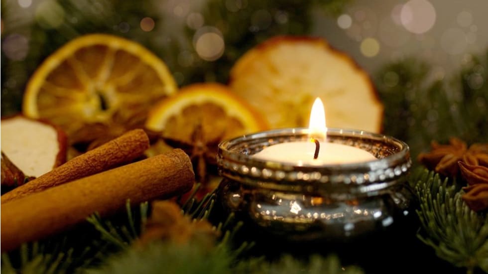 cinnamon stick next to candles