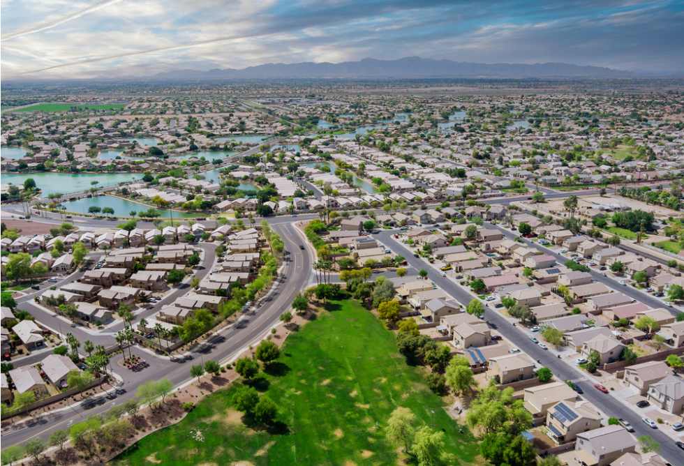  Aerial view of a small sleeping area roofs of the houses in the Avondale small towns Avondale small town landscape on Arizona