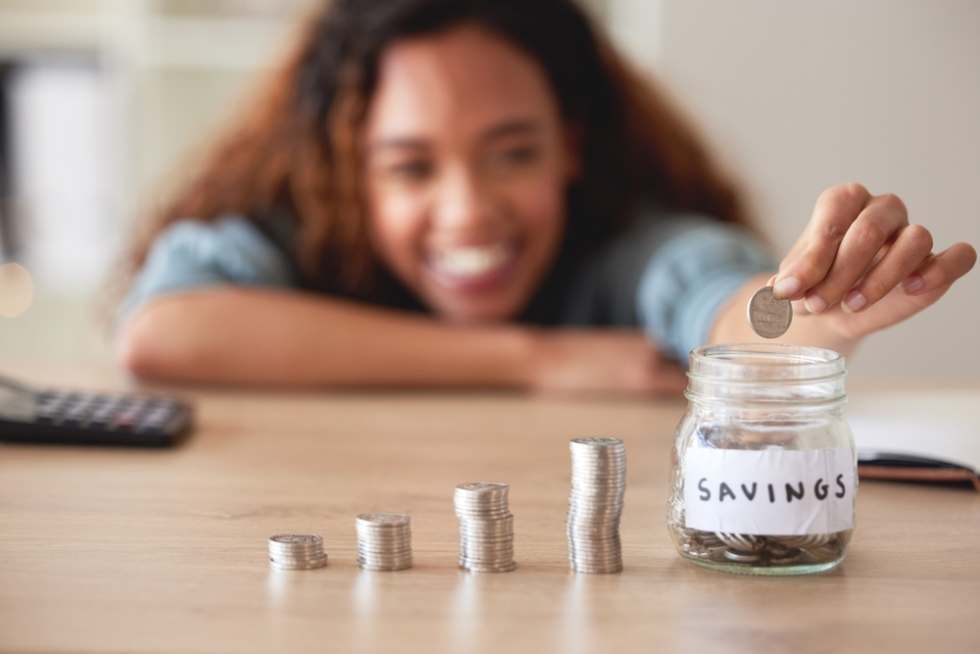 Young adult saving to move out of parents' house