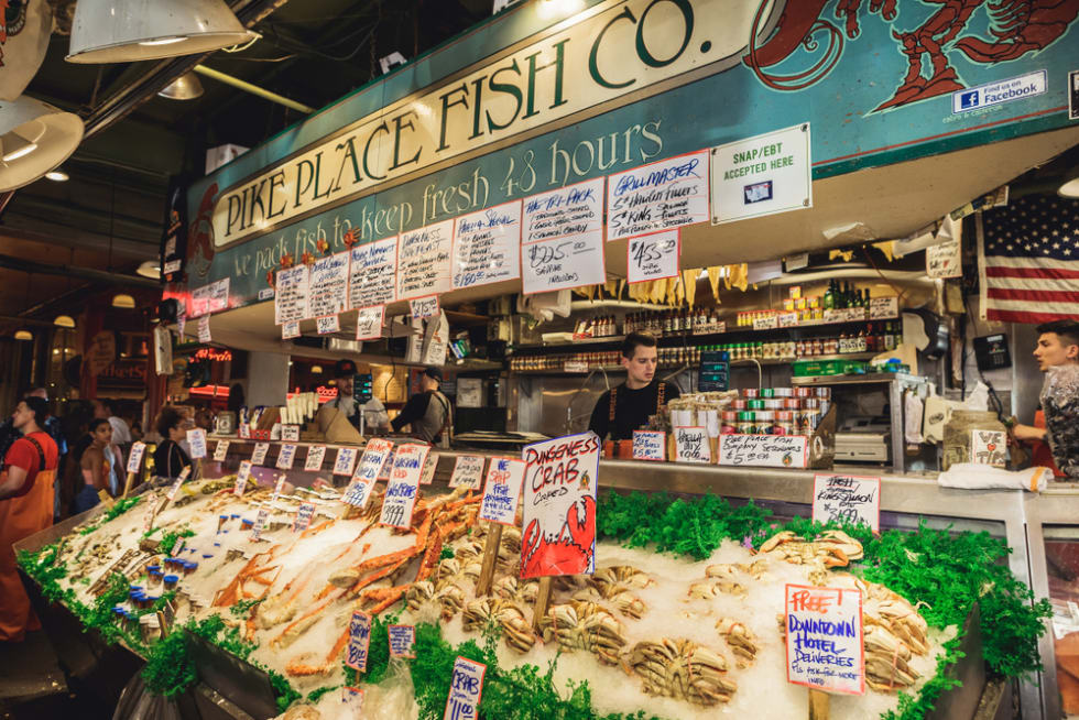seafood selling at Pike Place Fish Market in Seattle, Washington