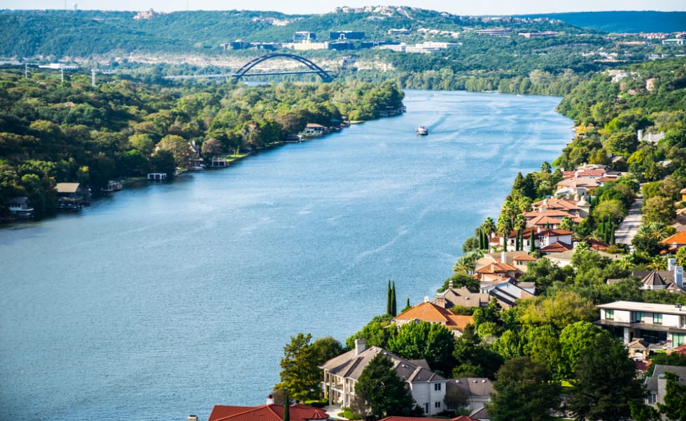 Sunny Day on Top of Mount Bonnell Overlooking Colorful Mansions on West Lake Austin Texas