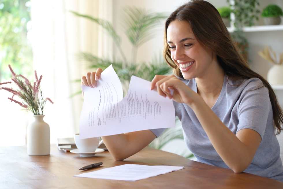 Happy woman canceling her renters insurance