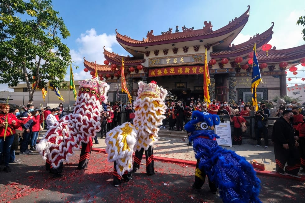 Lion dancers perform at the Thien Hau Temple on the first day of the Chinese Lunar New Year, the Year of the Tiger on the Chinese zodiac during the