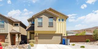 4 bed | 2 1/2 bath | 2 car garage in Desert Canyon with washer/dryer/fridge! Gallery 1