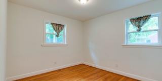 Discover the epitome of stylish living in this meticulously updated mid-century brick ranch, now available for rent. Gallery 18