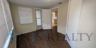 True 3 Bed~2 Bath~with garage. Over 1,000 sq ft, with updated kitchen & bathrooms, large open living space & a fenced in yard!! Gallery 16
