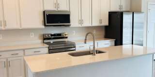 Brand New 4 Bed 3.5 Bath End Unit Townhome in Inwood Gallery 1