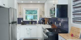 Discover this beautifully updated full brick single-family home in the heart of the historic Wesley Heights neighborhood, just minutes from Uptown Charlotte Gallery 11