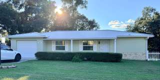 Beautiful 3/2 with large yard, new floors, and updated bathrooms! Gallery 1