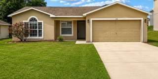 Charming 3-Bedroom Home with New Roof in Quiet Poinciana Location! Charming 3-Bedroom Home with New Roof in Quiet Poinciana Location! Gallery 1