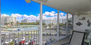 ** OFF-SEASONAL OR 6 MONTHS AND 1 DAY TO 8 MONTHS ANNUAL 1 BEDROOM\1 BATH CONDO AVAILABLE MAY-DECEMBER 2026  ** VANDERBILT TOWERS ** LARGEST 25 FOOT LANAI WITH STRAIGHT VIEW OF THE MARINA AND GULF OF MEXICO VIEWS ** Gallery 1