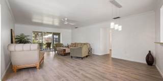 WELCOME TO THIS BEAUTIFULLY UPDATED 2 BEDROOM, 2 BATHROOM VILLA LOCATED IN THE DESIRABLE CENTER GATE COMMUNITY OF SARASOTA! Gallery 4