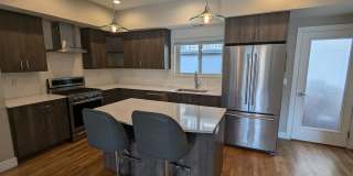STUNNING 4-LEVEL TOWNHOME IN HIGHLANDS W/ 2-CAR GARAGE +AMAZING ROOFTOP DECK WITH VIEWS! Gallery 7