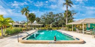 WELCOME TO THIS BEAUTIFULLY UPDATED 2 BEDROOM, 2 BATHROOM VILLA LOCATED IN THE DESIRABLE CENTER GATE COMMUNITY OF SARASOTA! Gallery 32