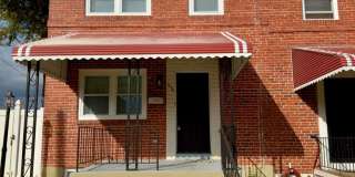 Spacious 3Bed/2Bath Townhome with Modern Amenities and Outdoor Space in Woodlawn MD Gallery 1