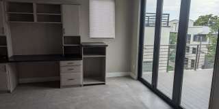 STUNNING 4-LEVEL TOWNHOME IN HIGHLANDS W/ 2-CAR GARAGE +AMAZING ROOFTOP DECK WITH VIEWS! Gallery 24