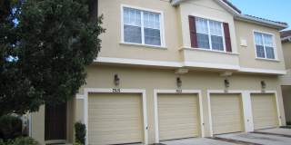 Spacious 3/2 Condo in the Gated Oakwater Community with Single Car Garage! Brand new carpets and Freshly Painted! Gallery 1