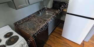 1123-1125 W 40th St. Gallery 12