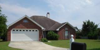 3 bedroom 2 1/2 Bath brick single family home in Covil Estates just around the corner from Mayfaire. Gallery 1