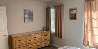 Location! Location! Terrific Four bedroom Three Bath Home with Two Car Garage including Lake Rights! Gallery 14