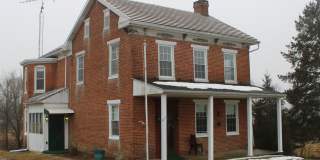 Cozy Single-Family Farmhouse with Rustic Character Gallery 1