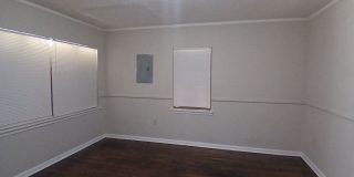 Renovated 2 bedroom 1 bath Duplex - Open To Section 8 - $99 Move In Special Gallery 4