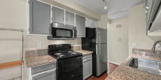 Spacious 2BR/2BA Corner Unit with Finished Basement, Private Patio & Garage Gallery 8