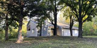 Newly Remodeled Estate Home on 5 Wooded Acres in the Middle of Plymouth!  2 Fireplaces, Vaults, Granite, More! Gallery 1