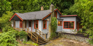 Rare Secluded Retreat with Lush Gardens and Timeless Character Gallery 1