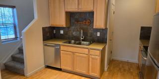 2 story, 2 bedroom unit with attached 1 car garage and private yard. Gallery 13