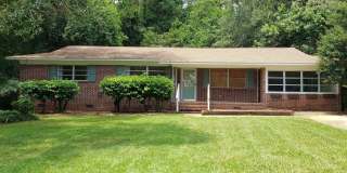 Charming 4 bedroom home for rent close to hospitals with wood floors. Available early August 2026 for $2000 Gallery 1